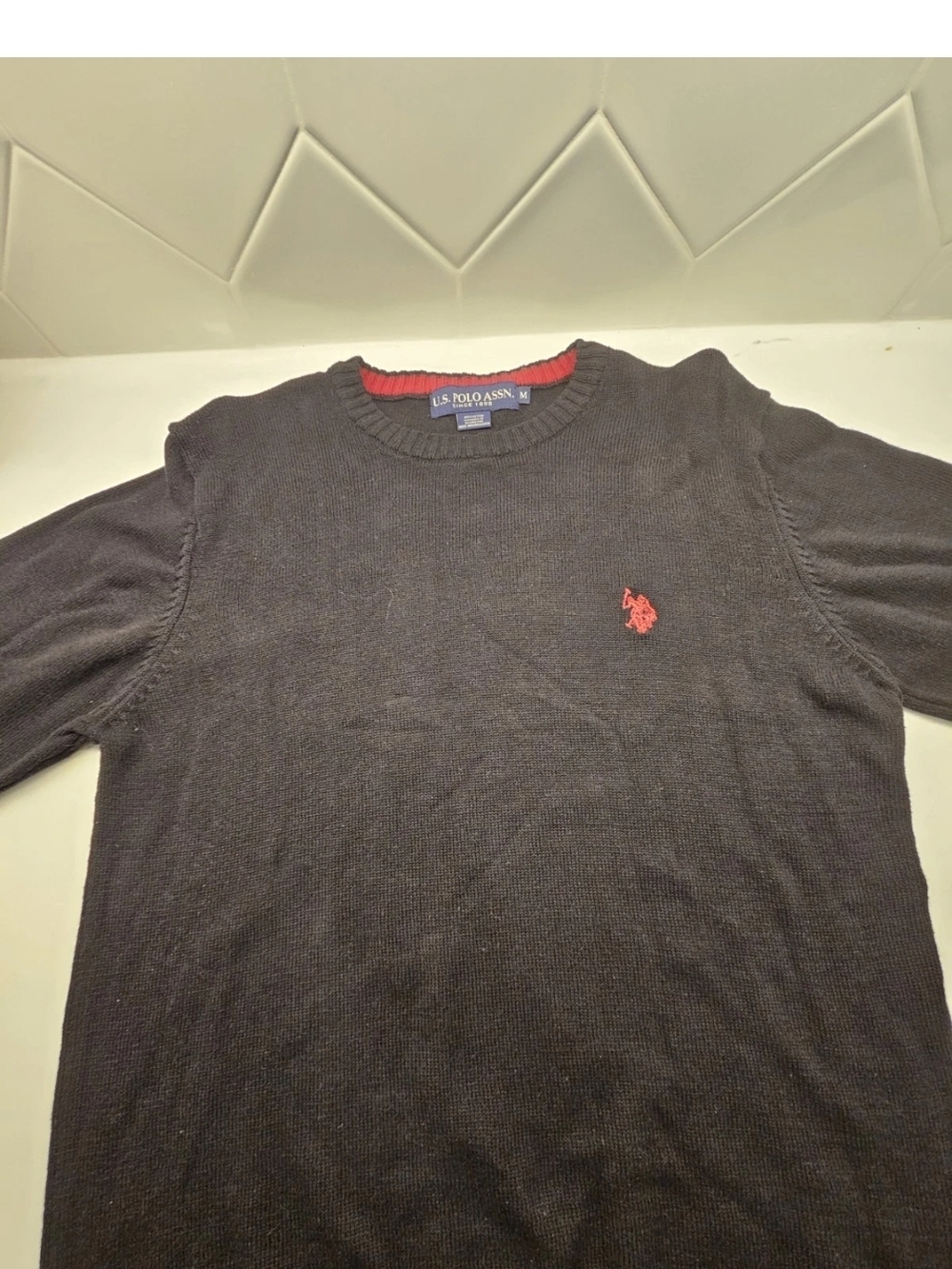 U.S. Polo Assn. Black Crewneck Sweater with Red Logo Accent